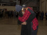 This photo provided by the U.S. Army shows WNBA star Brittney Griner, right, being greeted by wife Cherelle after arriving at Kelly Field in San Antonio following her release in a prisoner swap with Russia, Friday, Dec. 9, 2022. Griner said she's "grateful" to be back in the United States and plans on playing basketball again next season for the WNBA's Phoenix Mercury a week after she was released from a Russian prison and freed in a dramatic high-level prisoner exchange. "It feels so good to be home!" Griner posted to Instagram on Friday, Dec. 16, 2022, in her first public statement since her release. (Miquel A. Negro/U.S.