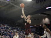 Gonzaga forward Drew Timme (2) reacts after dunking during the second half of an NCAA college basketball game against Montana, Tuesday, Dec. 20, 2022, in Spokane, Wash. Gonzaga won 85-75.