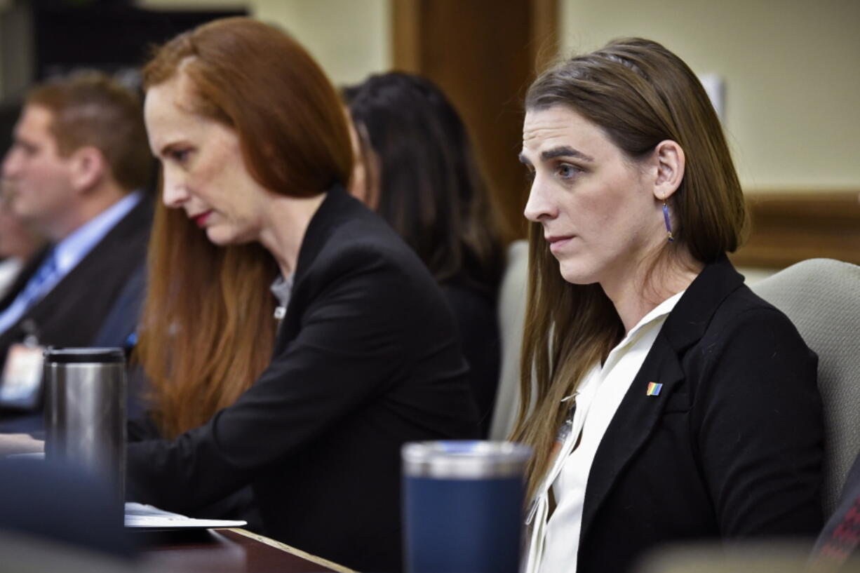 Zooey Zephyr, right, attends a legislative training session at the state Capitol in Helena, Mont., on Nov. 16, 2022. Zephyr, who is one of the first two transgender candidates elected to the Montana Legislature, says she hopes her presence will help fellow lawmakers better understand the trans community and lead them to avoid proposing legislation that can legitimize violence against the transgender community.