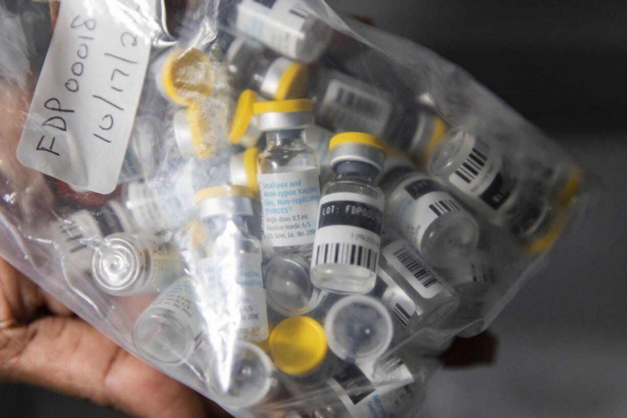 FILE - Vials of single doses of the Jynneos vaccine for mpox are seen from a cooler at a vaccinations site on Aug. 29, 2022, in the Brooklyn borough of New York. The federal government plans to end in January 2023 the public health emergency it declared earlier this year after an outbreak of mpox left more than 29,000 people across the U.S.