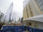 One World Trade, left, is seen next to St. Nicholas Greek Orthodox Church in New York.