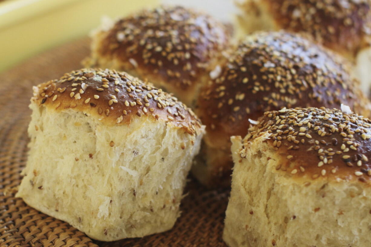 FILE - Sesame dinner rolls are photographed in Concord, N.H. on Oct. 12, 2015. A new federal law requiring that sesame be listed as an allergen on food labels is having unintended consequences _ increasing the number of products that include the ingredient. Starting Jan. 1, all foods made and sold in the U.S. must be labeled if they contain sesame, an often-hidden ingredient that's been declared the nation's ninth major allergen.