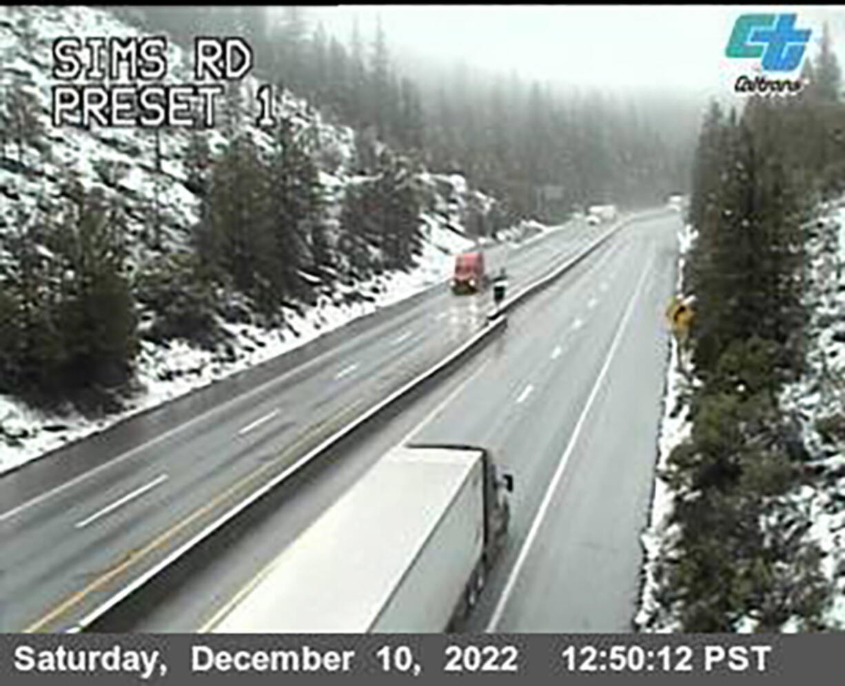 This image from a Caltrans traffic camera shows snow conditions on California Interstate 5 Sims Road in Shasta-Trinity National Forest, near Castella, Calif., on Saturday, Dec. 10, 2022. A stretch of California Highway 89 was closed due to heavy snow between Tahoe City and South Lake Tahoe, Cali., the highway patrol said. Interstate 80 between Reno and Sacramento remained open but chains were required on tires for most vehicles.