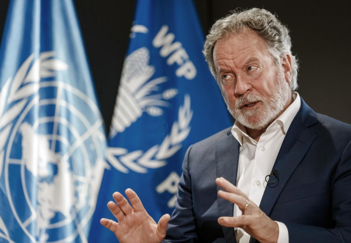 FILE - World Food Program Executive Director David Beasley speaks during an interview with The Associated Press at the WFP headquarters in Rome, Nov. 2, 2021. Beasley announced Saturday, Dec. 17, 2022, that he will step down from his role as executive director of the U.N. World Food Program, ending a six-year term heading the world's largest humanitarian organization.