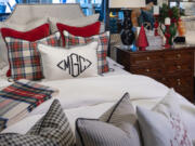 Plaid is a seasonal addition to this neutral bedding, giving it a wintry update.