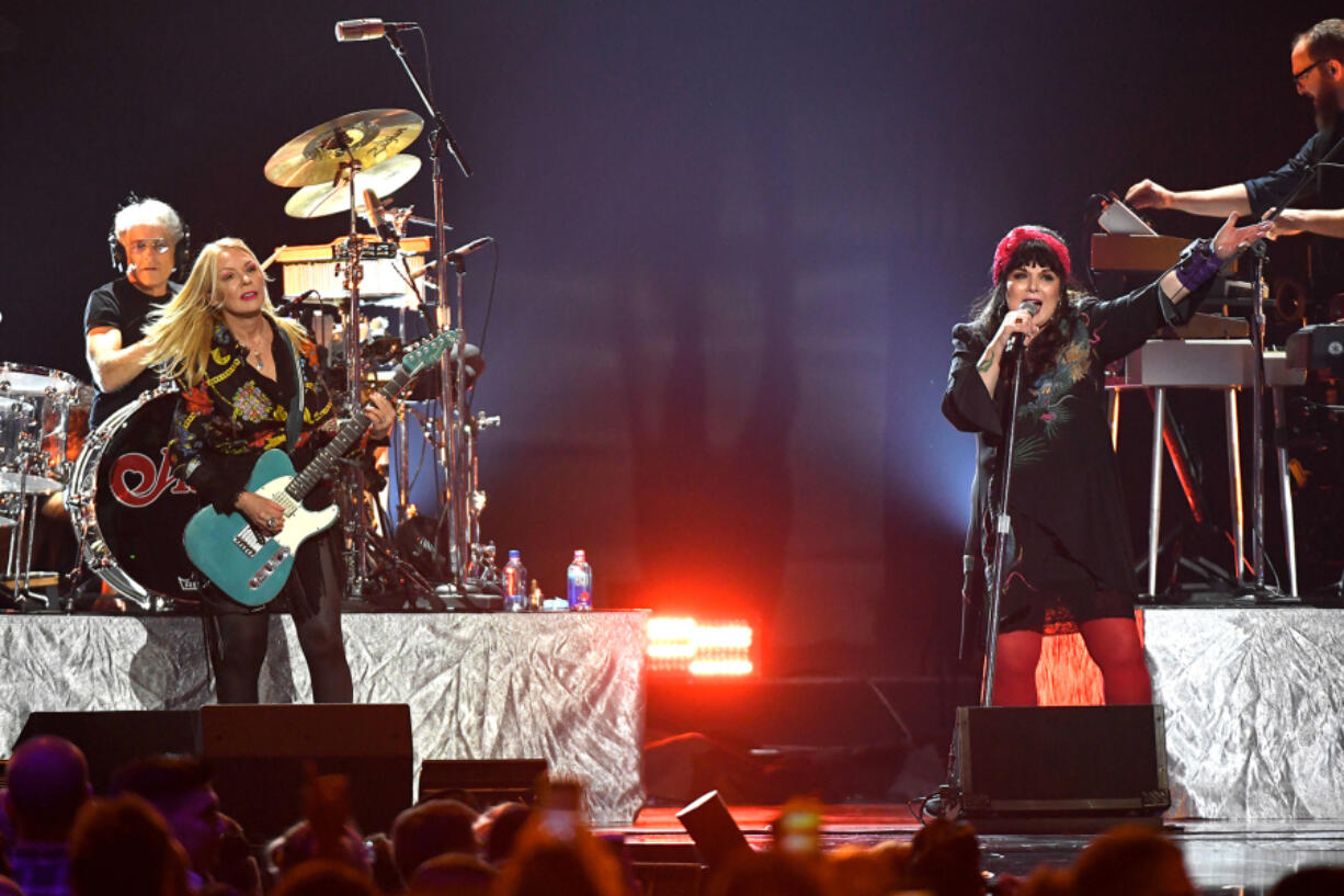 Nancy Wilson, left, and Ann Wilson of Heart perform onstage during the 2019 iHeartRadio Music Festival at T-Mobile Arena in Las Vegas.