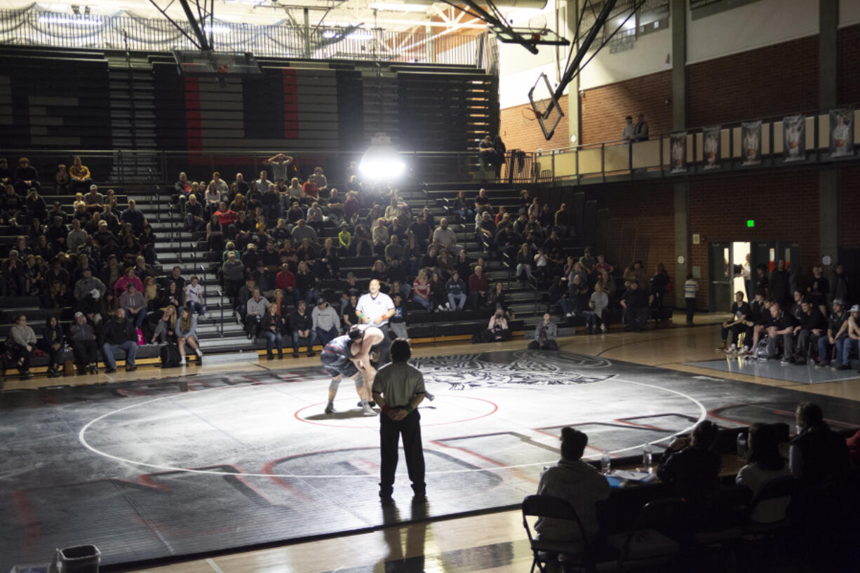 Kayden Miller of Union wrestles Cameron Hanley of Camas in a wrestling dual match at Union HIgh School on Wednesday, Jan. 18, 2023.