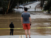 Uvas Creek floods a section of Miller Avenue in Gilroy, California, as the latest series of atmospheric rivers hit the Bay Area on Monday, Jan. 9, 2023.