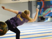 Columbia River's Sadie Burrows bowls during a match against Fort Vancouver at Hazel Dell Lanes on Friday, Jan. 20, 2023.