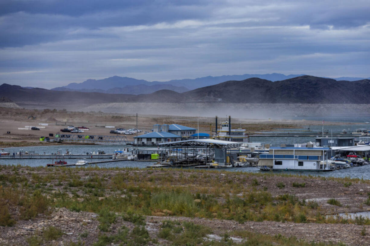 Dust is kicked up from a bulldozer with Las Vegas Boat Harbor recently moved further into the receding Lake Mead at the Lake Mead National Recreation Area on Tuesday, Dec. 27, 2022, in Boulder City. (L.E.