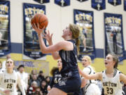 King’s Way Christian’s Bridget Quinn, center, goes up for a shot during a Trico League girls basketball game against Seton Catholic on Tuesday, Jan. 31, 2023, at Seton Catholic College Prep.