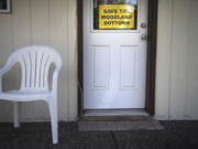 A sign advocating against residential developments in the Woodland Bottoms is seen at a home in 2019.