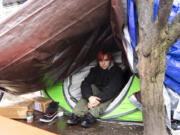 Angellina Ricker, 23, became homeless after aging out of the foster care system in Clark County. She now lives at a homeless encampment in downtown Vancouver in a tent she shares with her boyfriend.