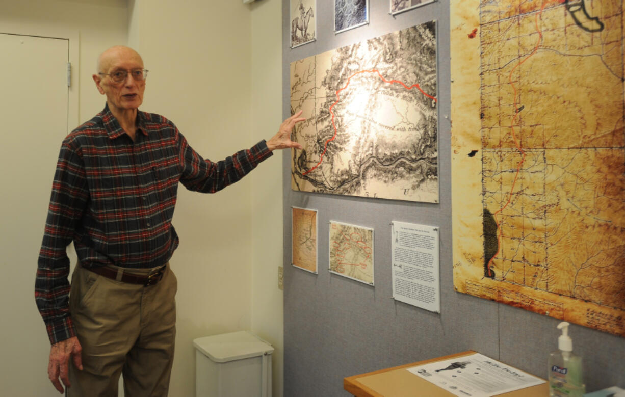 Battle Ground author Don Higgins explains how he found the many documents included in an exhibit about the city's history at the Battle Ground Community Library.