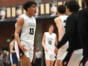 Union senior Yanni Fassilis, left, celebrates Friday, Jan. 6, 2023, during the Titans’ 61-41 win against Skyview at Union High School.