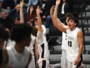 Union starters celebrate in the waning seconds Friday, Jan. 6, 2023, during the Titans’ 61-41 win against Skyview at Union High School.