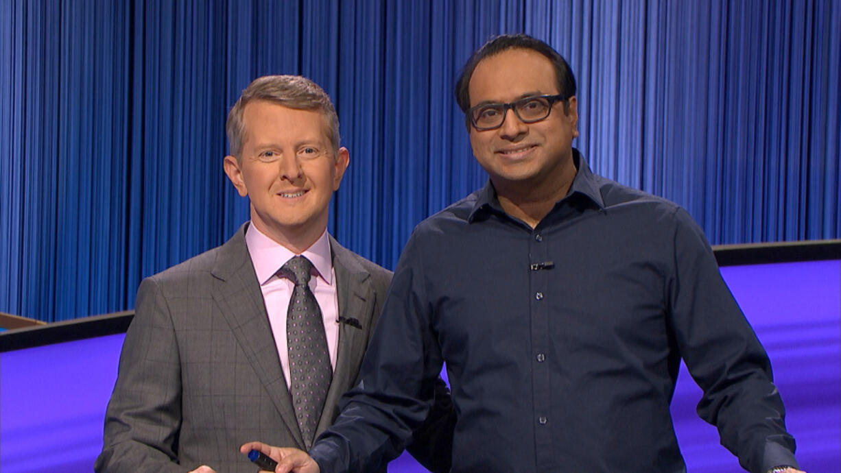 Vancouver resident Yogesh Raut, right, will appear on "Jeopardy!" hosted by Ken Jennings on Wednesday.