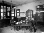 This lunchroom shows Weinhard Brewery employees sitting around a table in about 1910. They worked nine-hour days, six days a week. Henry Weinhard (1830-1904) followed the 1891 United Brewery Workmen Contract entitling workers to free beer during their shifts, a common practice in breweries then.