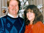 Michael Johnson photographed with his partner, Joyce, in the 1990s.