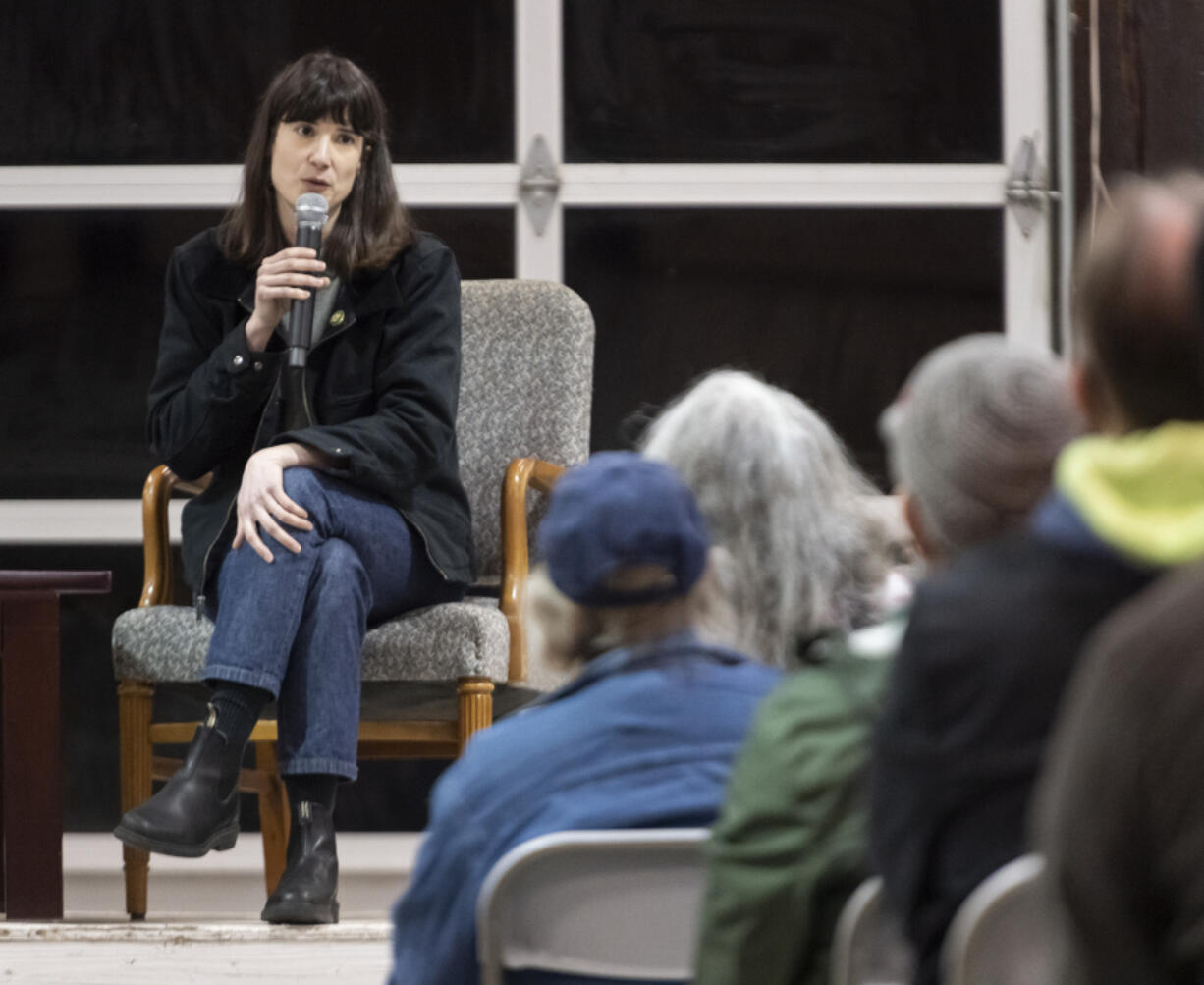 Rep. Marie Gluesenkamp Perez addresses the audience during the 70-minute written Q&A portion of the town hall.