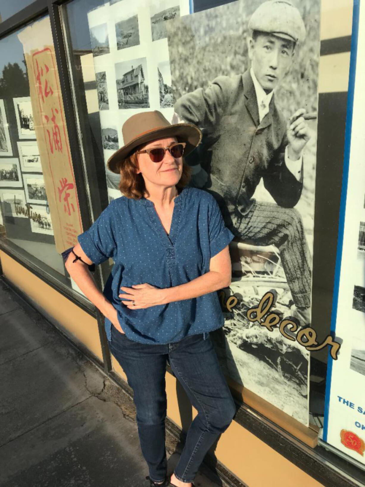 Vancouver filmmaker Beth Harrington is working on a documentary about Frank Matsura, pictured in the photo display next to her.