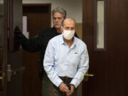 Suspected serial killer Warren Forrest leaves the courtroom after jury selection in his 1974 cold-case murder trial at the Clark County Courthouse on Tuesday morning.