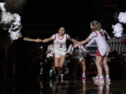 Camas junior Riley Sanz, center, is introduced Tuesday, Jan. 31, 2023, before the Papermakers’ 77-34  win against Skyview at Camas High School.