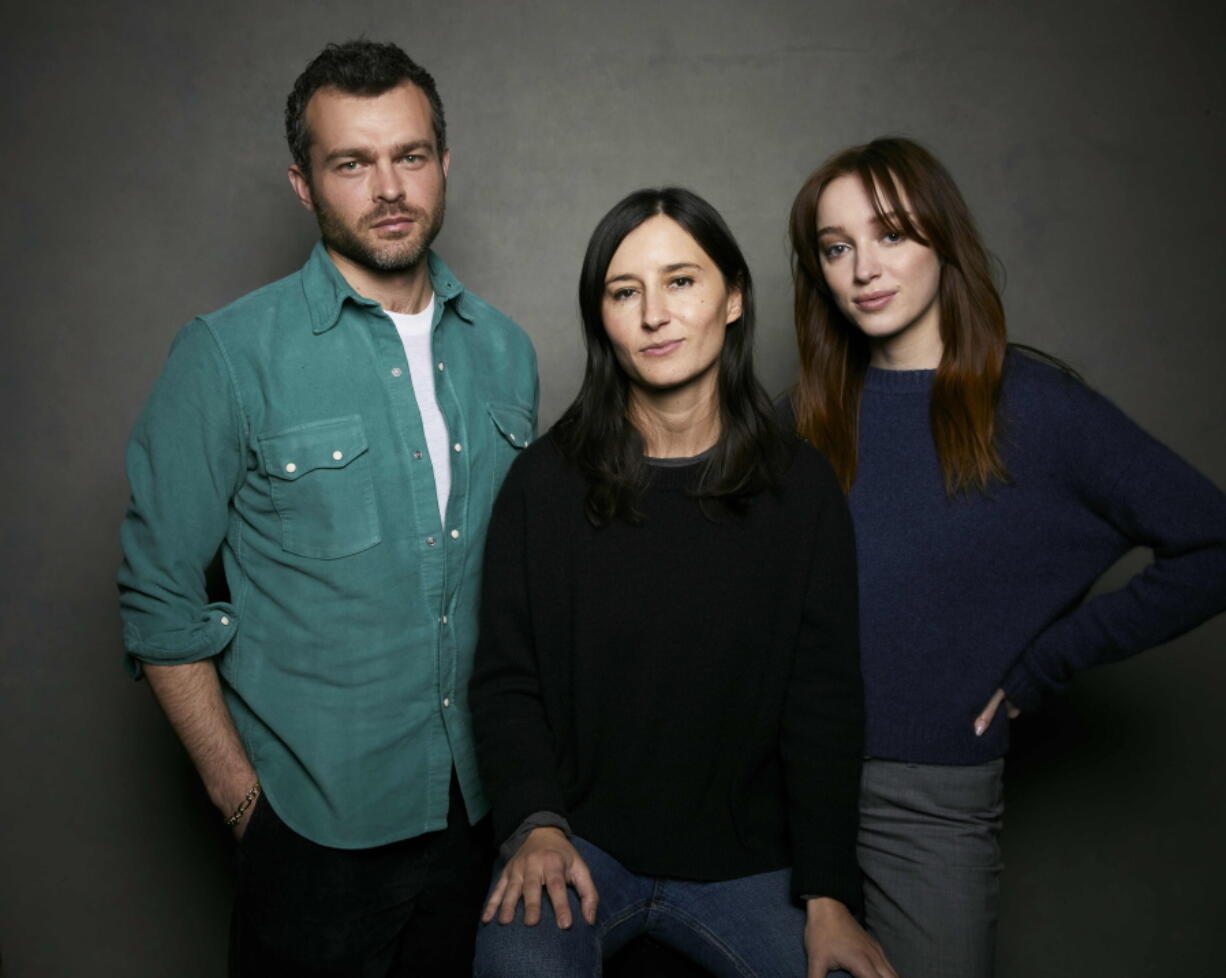 Alden Ehrenreich, from left, director Chloe Domont, and Phoebe Dynevor pose for a portrait to promote the film "Fair Play" at the Latinx House during the Sundance Film Festival on Saturday, Jan. 21, 2023, in Park City, Utah.