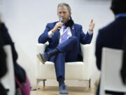 Rep. Sean Casten, D-Ill., speaks at an event at the US Climate Action Center at the COP26 U.N. Climate Summit in Glasgow, Scotland, Tuesday, Nov. 9, 2021. The U.N. climate summit in Glasgow has entered it's second week as leaders from around the world, are gathering in Scotland's biggest city, to lay out their vision for addressing the common challenge of global warming.