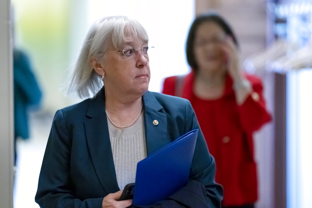 Sen. Patty Murray, D-Wash., emerges from a Democratic Caucus leadership meeting at the Capitol in Washington, Thursday, Dec. 8, 2022. In the new Congress starting Jan. 3, 2023, Sen. Murray will serve as president pro tempore, replacing the retiring Sen. Patrick Leahy, D-Vt., who is retiring, making her third in the order of succession for the presidency behind the vice president and speaker of the House. (AP Photo/J.