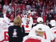 Canada's Shane Wright lifts the Championship Cup after Canada defeated Czechia in overtime during the title game in the IIHF world junior hockey championships Thursday, Jan. 5, 2023, in Halifax, Nova Scotia.