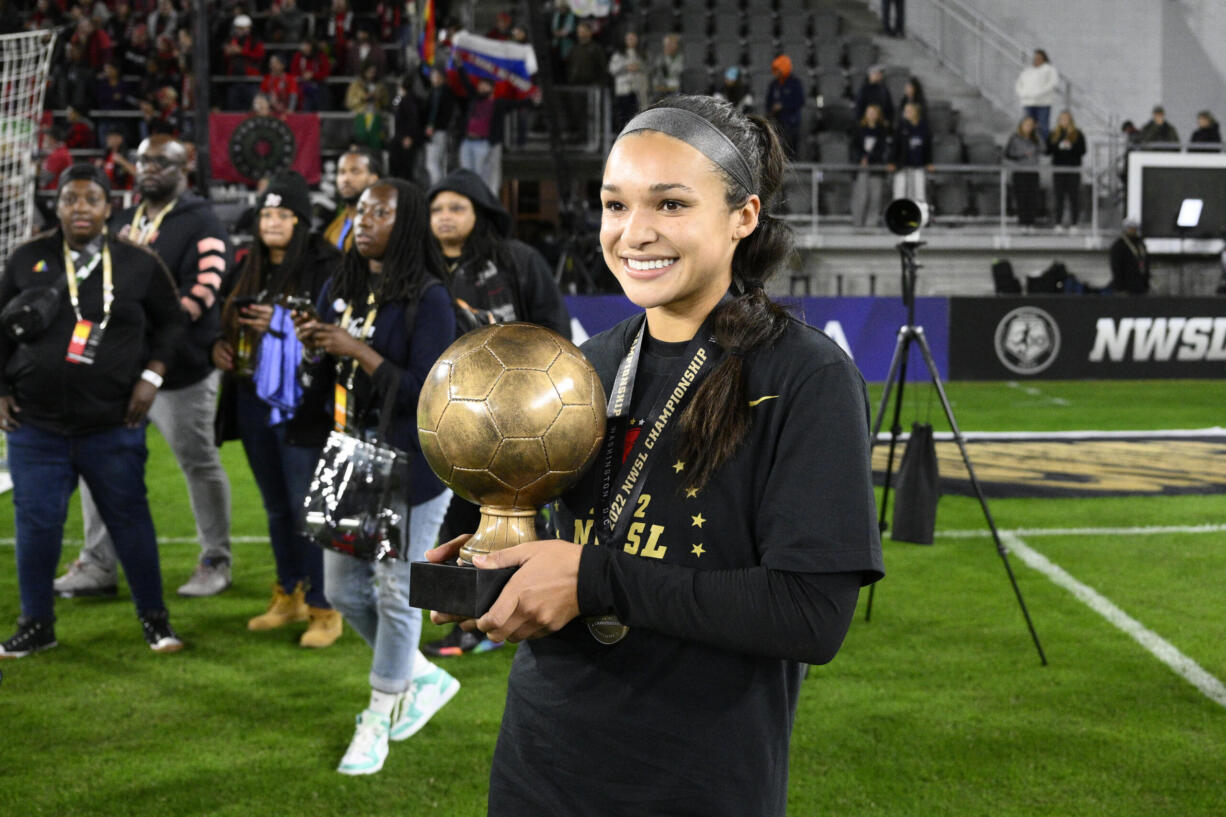 FILE - Portland Thorns FC forward Sophia Smith holds the MVP trophy after the NWSL championship soccer match against the Kansas City Current, Saturday, Oct. 29, 2022, in Washington. Forward Sophia Smith was named the U.S. Soccer Female Player of the Year on Friday, Jan.