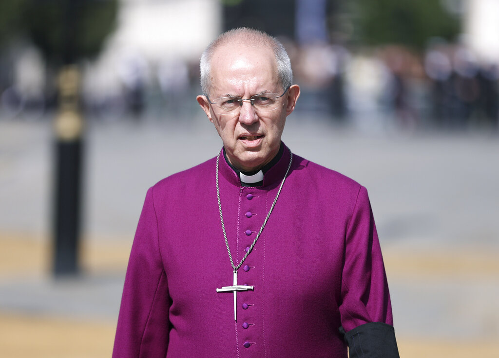 FILE - The Archbishop of Canterbury Justin Welby walks in Westminster on Sept. 14, 2022. The Church of England said Wednesday, Jan. 18, 2023, it will allow blessings for same-sex, civil marriages for the first time — but its position on gay marriage will not change and same-sex couples will still not be able to marry in its churches.