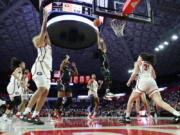 South Carolina guard Zia Cooke, second from right, shoots over Georgia guard Audrey Warren, right, during the second half of an NCAA college basketball game in Athens, Ga., Monday, Jan. 2, 2023.