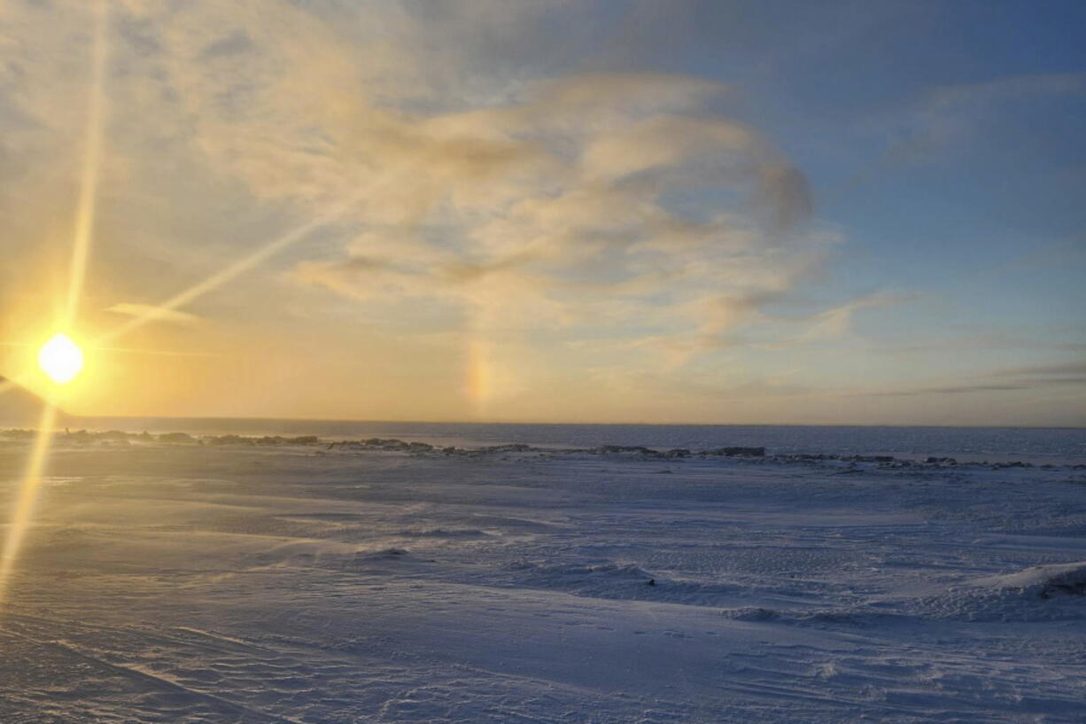 The view from the front of the school in in Wales, Alaska, where a 24-year-old woman and her 1-year-old son were killed in an encounter with a polar bear on Tuesday, Jan. 17, 2023, is seen in this photo taken on Sunday, Jan. 15, 2023, by Chrissy Friberg, a traveling optician who was providing services in the village.