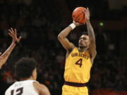 Arizona State guard Desmond Cambridge Jr. (4) looks to shoot a 3-point basket against Oregon State during the second half of an NCAA college basketball game in Corvallis, Ore., Saturday, Jan. 14, 2023.