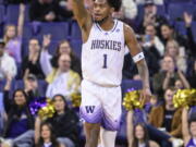 Washington's Keion Brooks celebrates after hitting a 3-pointer against Arizona State during the first half of an NCAA college basketball game Thursday, Jan. 26, 2023, in Seattle.