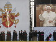 FILE - Bishops watch Pope Benedict XVI on a large video monitor during a rally with young people and seminarians at Saint Joseph's Seminary in Yonkers, N.Y., Saturday, April 19, 2008. Many of the conservative prelates who dominate the U.S. Conference of Catholic Bishops were appointed by Benedict. Even after his death in December 2022, Catholic academics and clergy say his absence is unlikely to weaken the conservatives' collective power or end the culture wars that have divided the USCCB.