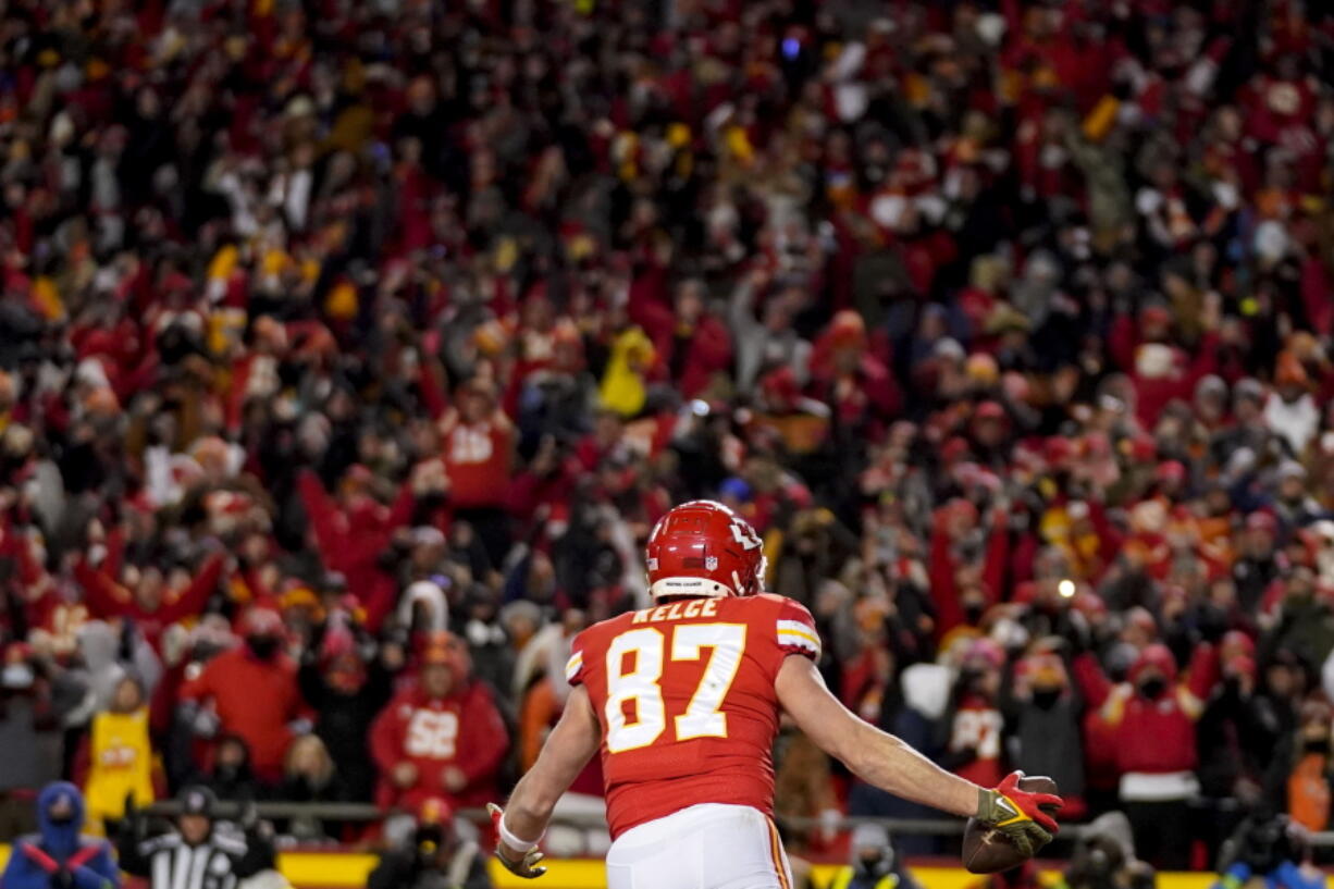 Kansas City Chiefs tight end Travis Kelce (87) celebrates his touchdown reception against the Cincinnati Bengals during the first half of the NFL AFC Championship playoff football game, Sunday, Jan. 29, 2023, in Kansas City, Mo.