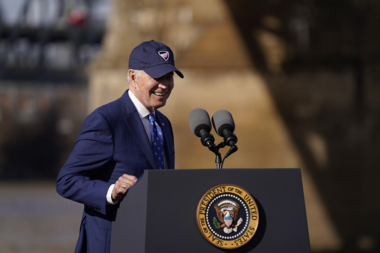 President Joe Biden arrives to speak about his infrastructure agenda under the Clay Wade Bailey Bridge, Wednesday, Jan. 4, 2023, in Covington, Ky.