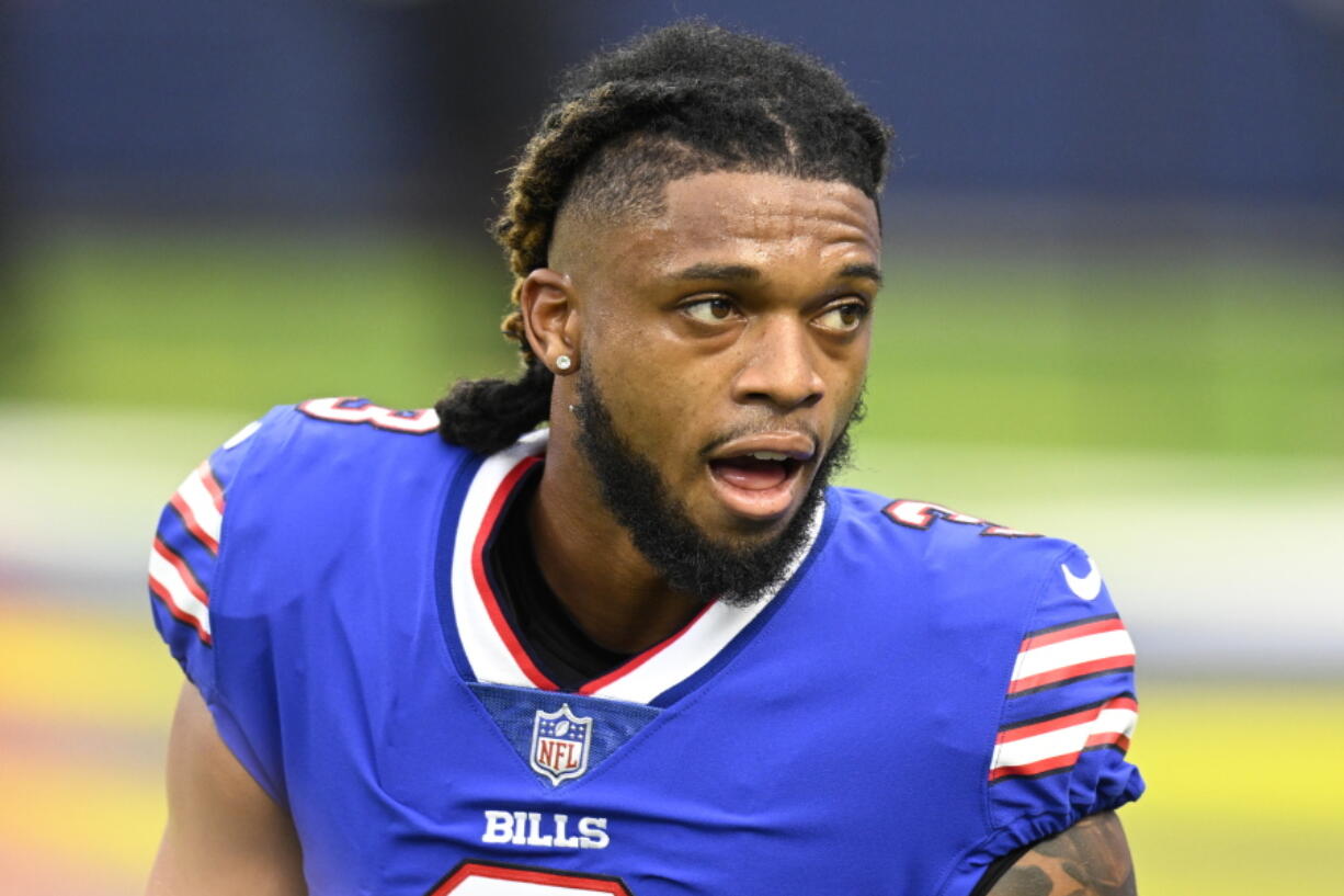 FILE - Buffalo Bills Damar Hamlin with his helmet off before playing the Los Angeles Rams during an NFL football game, Sept. 8, 2021, in Inglewood, Calif. The scenes of Hamlin's on-field collapse after suffering cardiac arrest on Monday, Jan. 2, 2023, has forced some fans to yet again confront a truth they have always known but hated to think about: Football can go from exciting and joyous to dark and tragic in a flash. Now, as the Bills defensive back remains in critical condition in a Cincinnati hospital, fans are reflecting on their relationship with the sport they love.