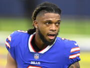 FILE - Buffalo Bills Damar Hamlin with his helmet off before playing the Los Angeles Rams during an NFL football game, Sept. 8, 2021, in Inglewood, Calif. The scenes of Hamlin's on-field collapse after suffering cardiac arrest on Monday, Jan. 2, 2023, has forced some fans to yet again confront a truth they have always known but hated to think about: Football can go from exciting and joyous to dark and tragic in a flash. Now, as the Bills defensive back remains in critical condition in a Cincinnati hospital, fans are reflecting on their relationship with the sport they love.