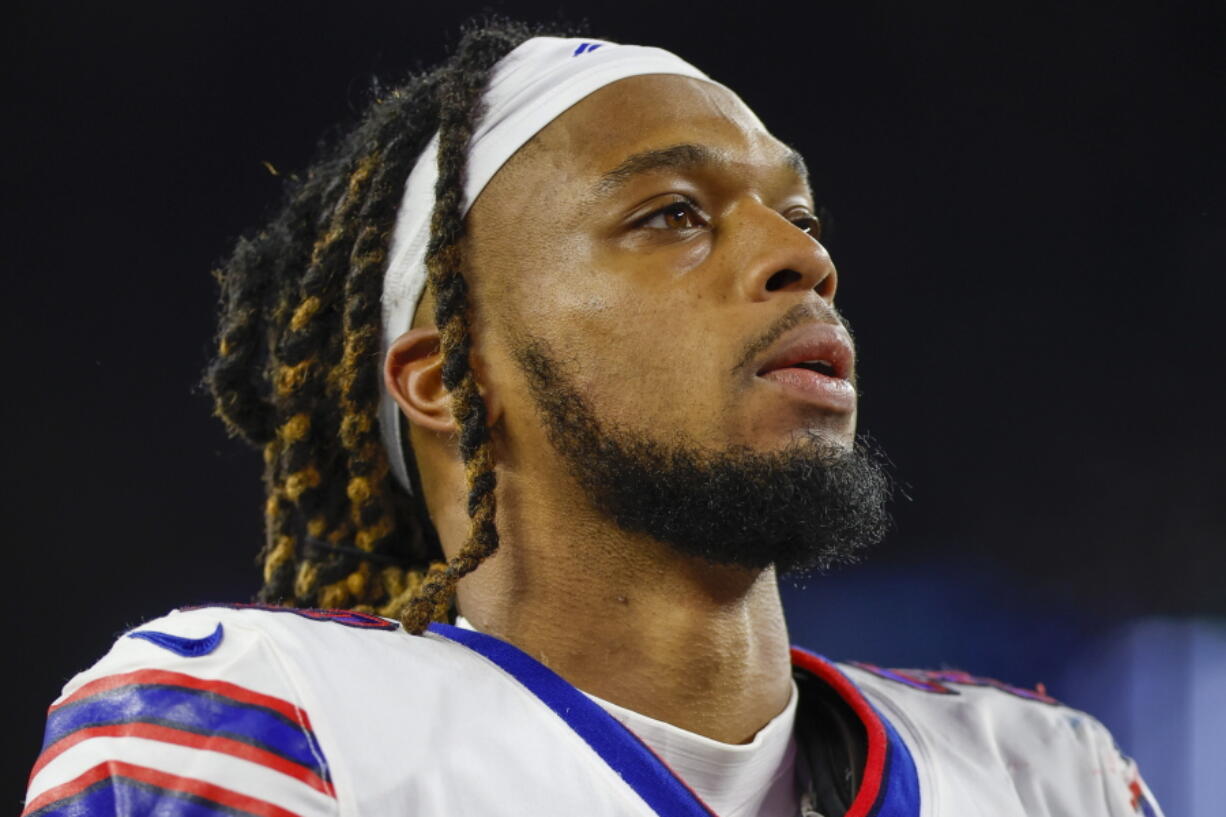 FILE - Buffalo Bills defensive back Damar Hamlin (3) leaves the field after an NFL football game against the New England Patriots, Thursday, Dec. 1, 2022, in Foxborough, Mass. Hamlin was in critical condition early Tuesday, Jan. 3, 2023, after the Bills say his heart stopped following a tackle during the Monday Night Football game, which was indefinitely postponed. (AP Photo/Greg M.