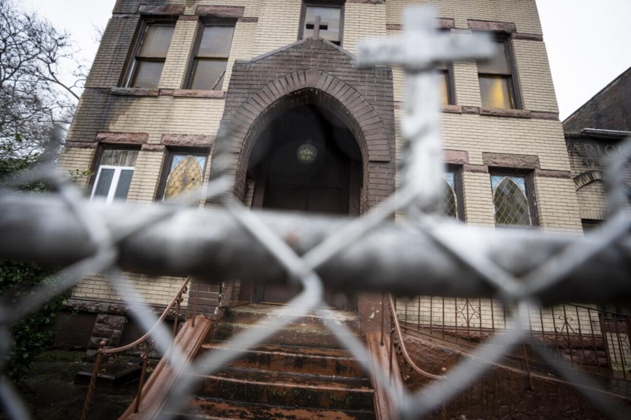 A rusted fence surrounds the Varick Memorial AME Zion Church, Thursday, Jan. 19, 2023, in the Brooklyn borough of New York. On Friday, a fund established to preserve historic Black churches in the United States formally revealed the first 35 houses of worship that will receive financial grants totaling $4 million.