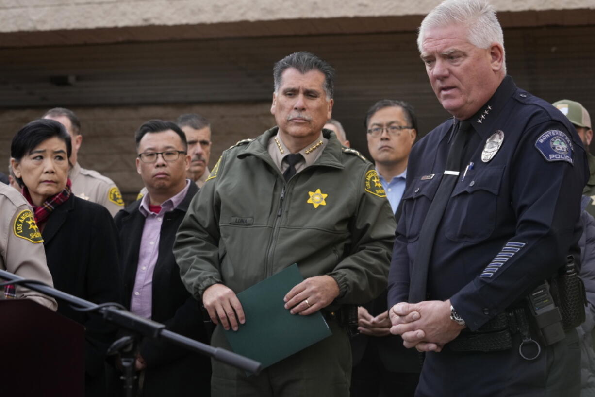 Los Angeles County Sheriff Robert Luna, center, and Monterey Park Chief of Police Scott Wiese, far right, brief the media outside the Civic Center in Monterey Park, Calif., Sunday, Jan. 22, 2023. At left, Rep. Judy Chu, and Monterrey Park Mayor Henry Lo. A mass shooting at a Los Angeles-area ballroom dance club following a Lunar New Year celebration, set off a manhunt for the suspect.