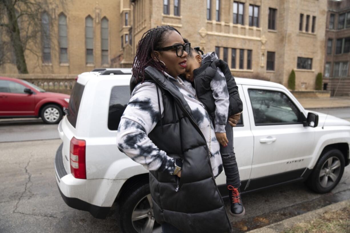 Chicago educator Tamisha Holifield spends time with her 2-year-old daughter Rian Holifield at Nichols Park, Thursday, Dec. 29, 2022, in the Hyde Park neighborhood of Chicago. When Holifield and her daughter had COVID-19 in May, the toddler had to miss 15 days of child care. Bouts of colds have followed in what Holifield described as a "constant whirlwind" of sickness that has been stressful both financially and emotionally. "It's a major inconvenience. But I'm a single parent, so I don't have a choice. If I drop the ball, the game is over," Holifield said.