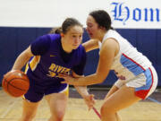 Rapid freshman Gracie Glavin heads toward the basket on Friday night at Mark Morris High School.   (Rob Hilson/For The Columbian)