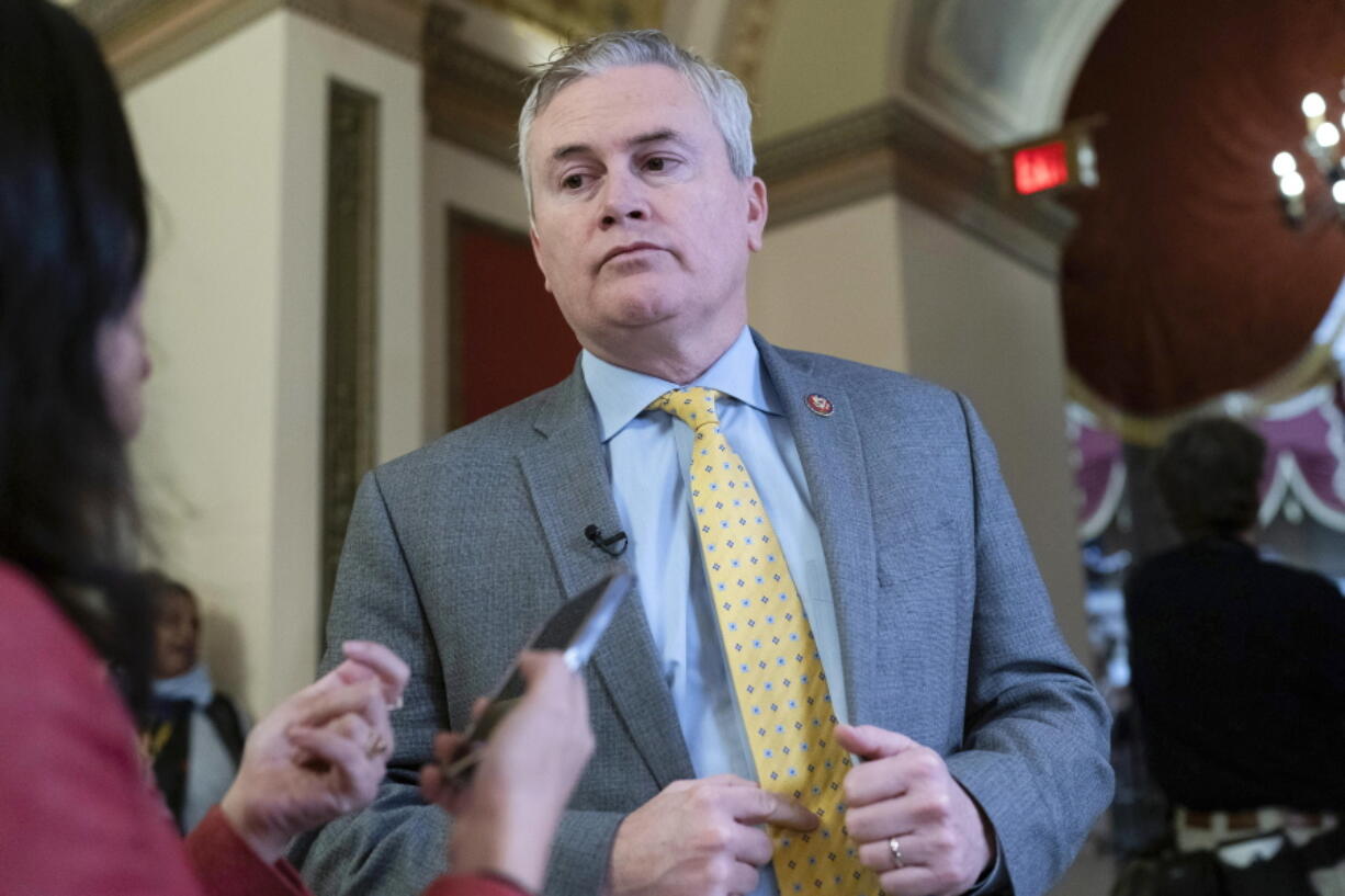 FILE - Rep. James Comer, R-Ky., talks to reporters as he walks to the House chamber, on Capitol Hill in Washington, Jan. 12, 2023.