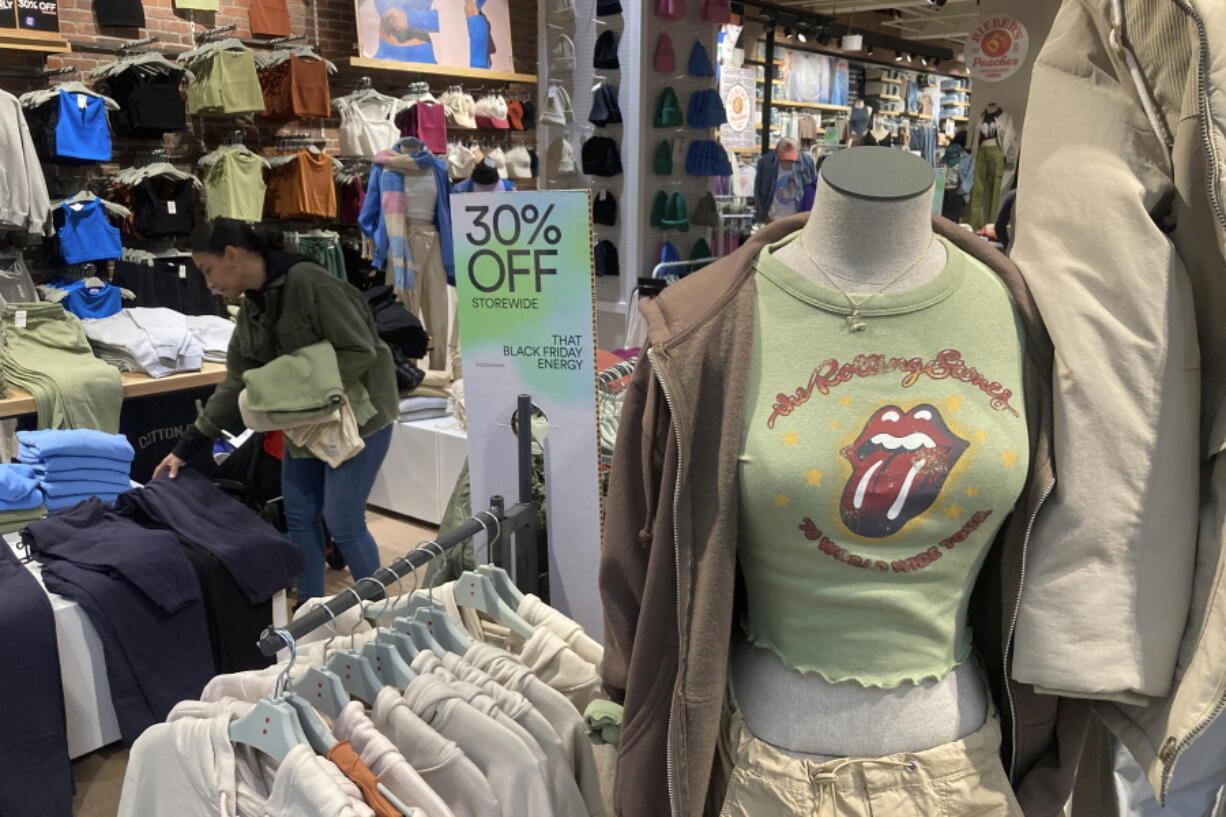 FILE - A Rolling Stones t-shirt from 1970 is displayed in the Westfield Garden State Plaza shopping mall in Paramus, New Jersey, on Saturday, December 17, 2022. On Thursday, the Labor Department reports on U.S. consumer prices for December.