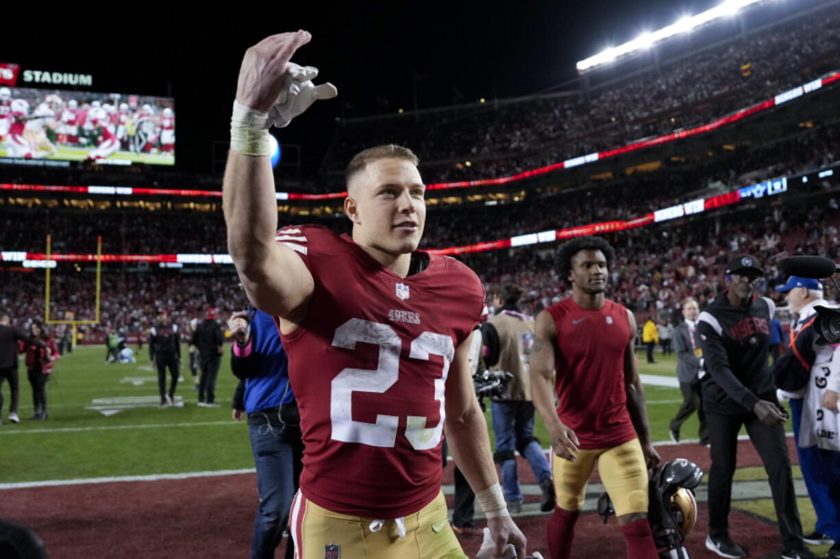 San Francisco 49ers running back Christian McCaffrey (23) celebrates after an NFL divisional round playoff football game against the Dallas Cowboys in Santa Clara, Calif., Sunday, Jan. 22, 2023.